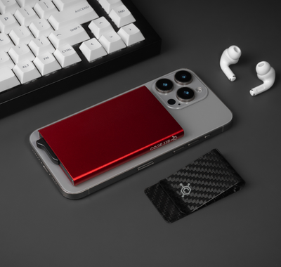 “Red aluminum MagSafe wallet attached to iPhone – slim RFID-blocking magnetic wallet design 2025”