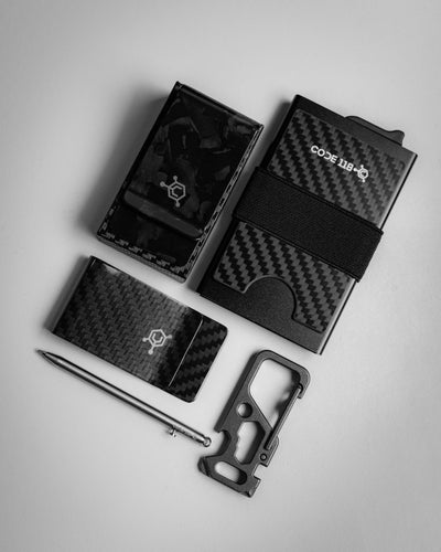Carbon fiber modular slim wallet with expansion add-ons, cash clip, and EDC tools for modern minimalists.